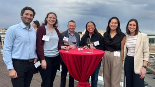 Group of Heinz alumni together outdoors at an alumni event in Washington, D.C.