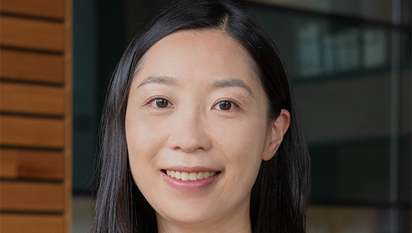 Wenjuan Jiang headshot, smiling at camera