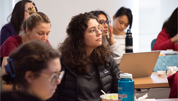 Students, faculty, and staff attend panel discussion.