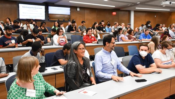 Students attend a presentation by Data Science for Social Good Fellows.