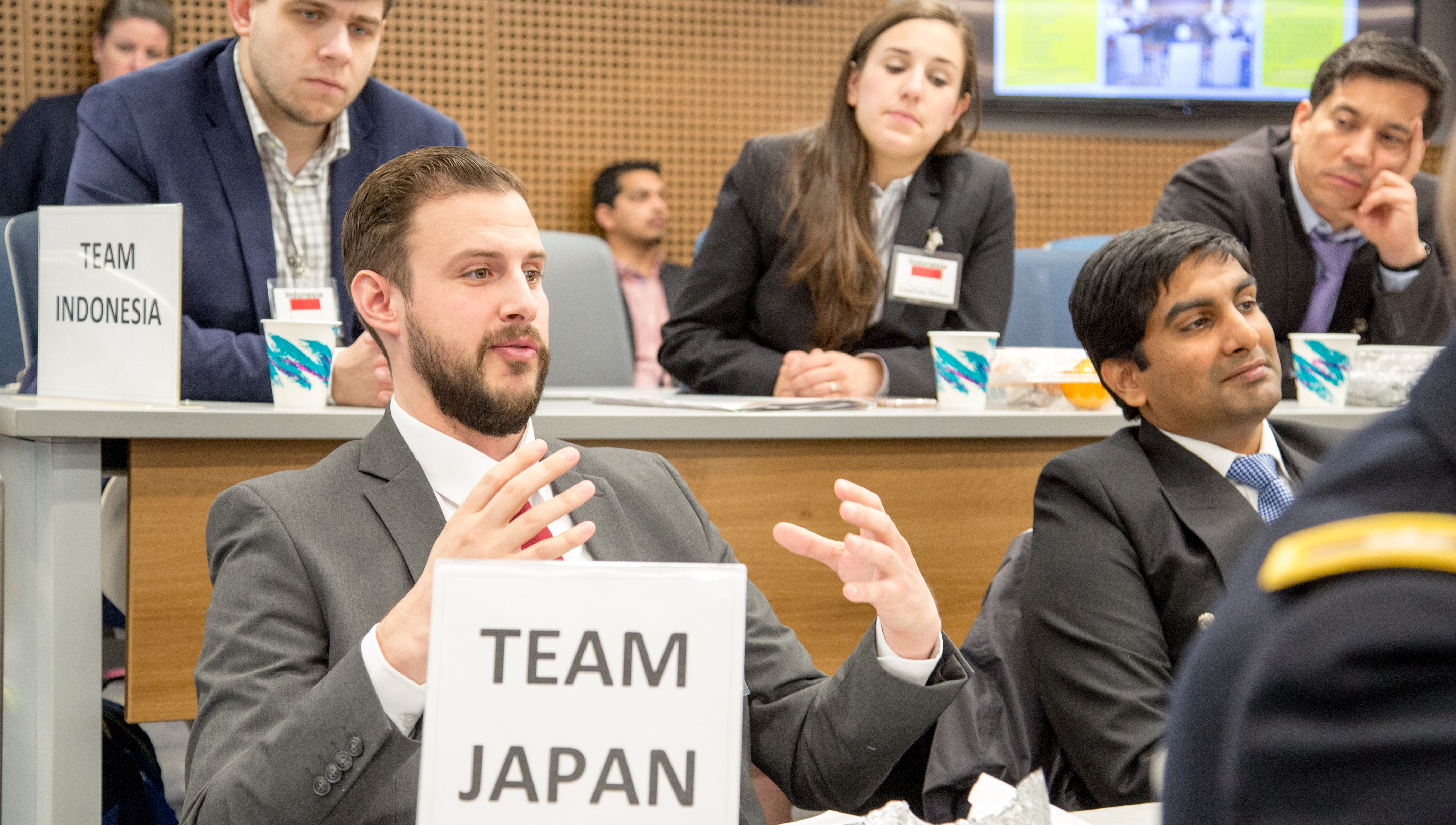 Heinz College students converse at the International Strategic Crisis Negotiation Exercise at Hamburg Hall