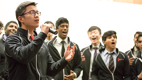 Heinz College students singing in a group