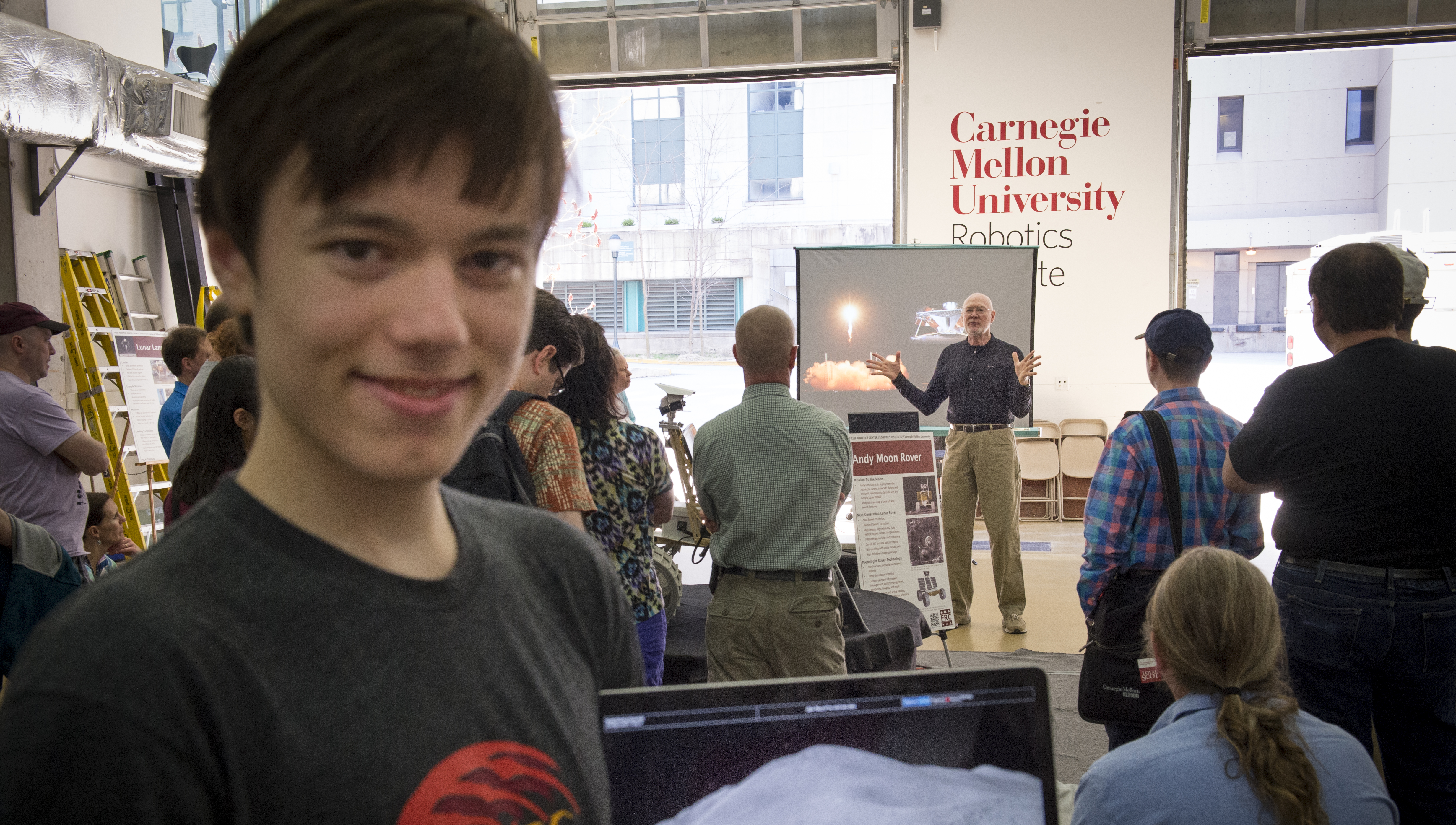 CMU student talking about a moon rover at the Carnegie Mellon University Robotics Institute