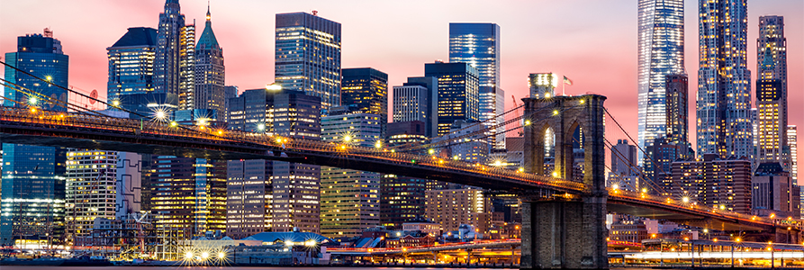 New York City Skyline and Brooklyn Bridge at dusk