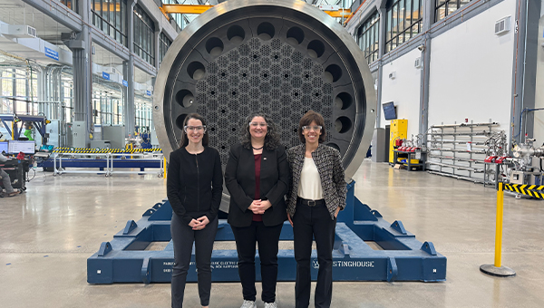 Abby Smith and colleagues with a large turbine.