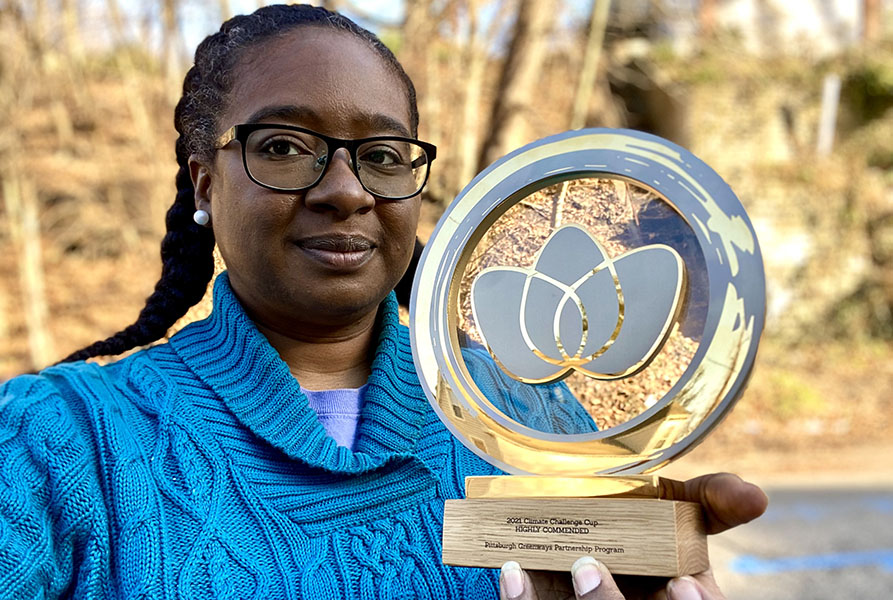 Heinz alumna Tiffany Taulton with her Climate Cup Challenge award