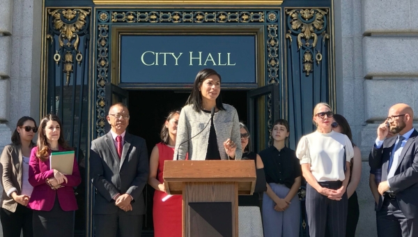 Zwart addresses a crowd in front of City Hall.