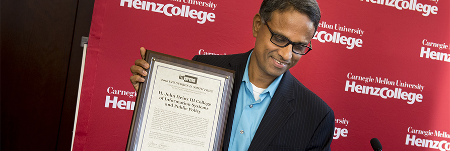 Ramayya Krishnan accepting the UPS George D. Smith Prize for Heinz College