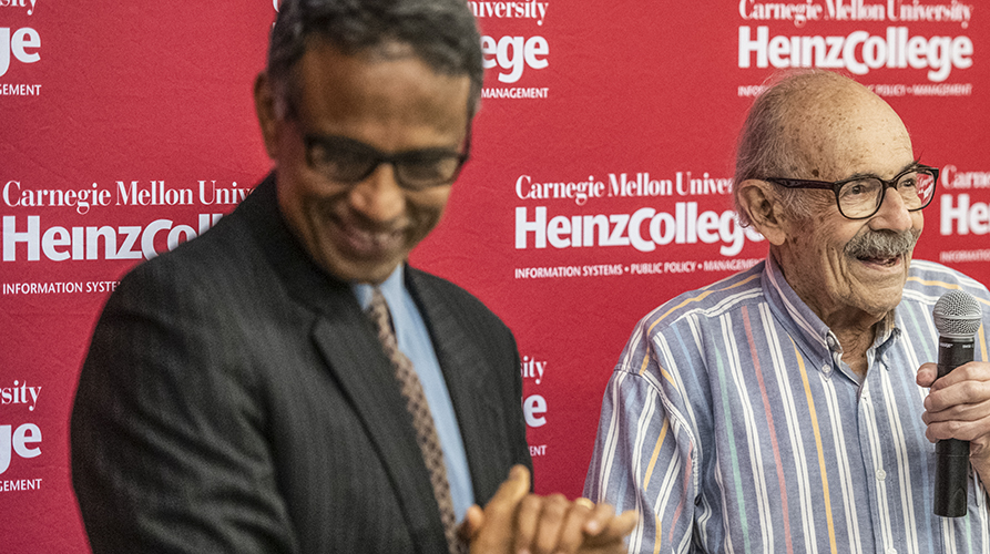 Krishnan and Al Blumstein at Professor Mike Smith's faculty chair ceremony