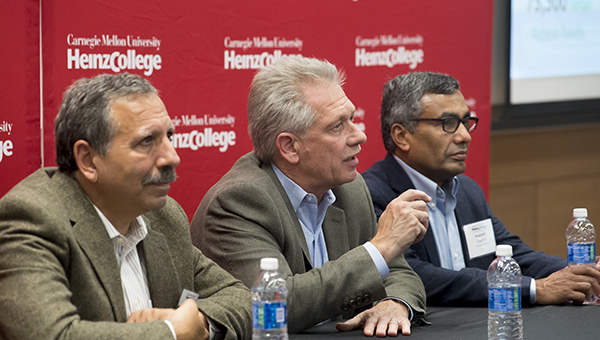 Representatives from UPS give a panel talk